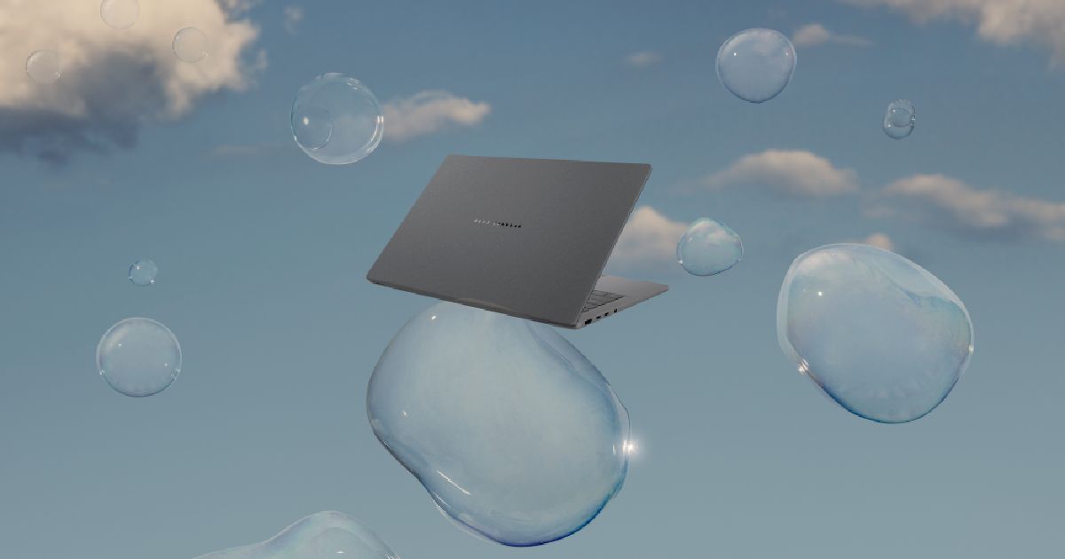 ASUS Zenbook A14 lơ lửng giữa các bong bóng nước, thể hiện độ nhẹ của máy